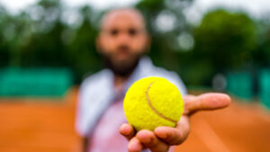 The Tennis Ball Exercise That Can Check Your Grip Strength (And Your Longevity) - Health Digest